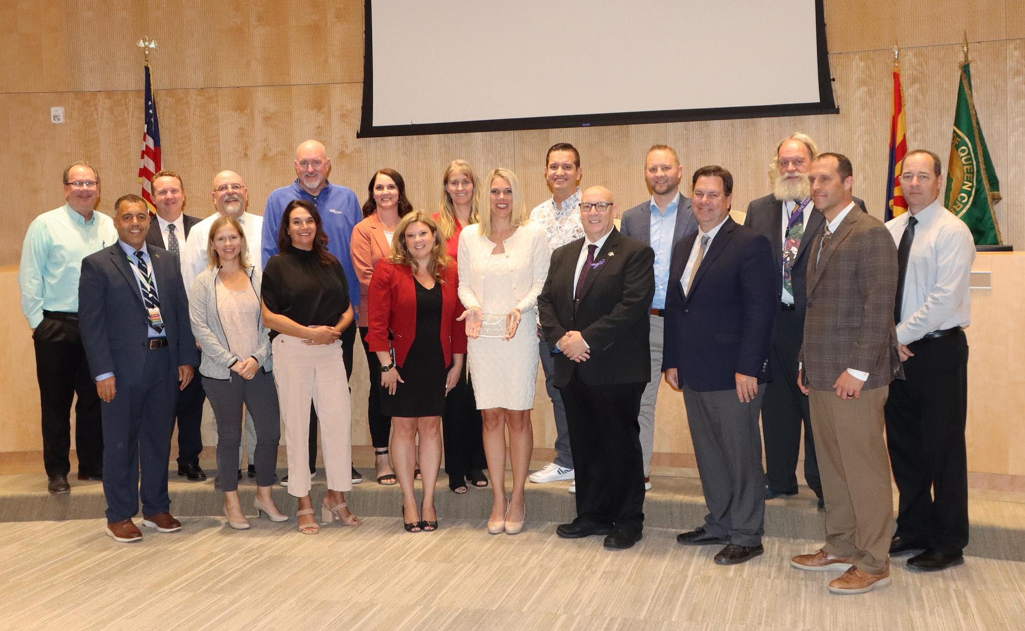 Queen Creek Mayor Julia Wheatley accepts the 2023 Manufacturing Champion of the Year award from the Arizona Manufacturers Council along with the Queen Creek Town Council and Town staff.